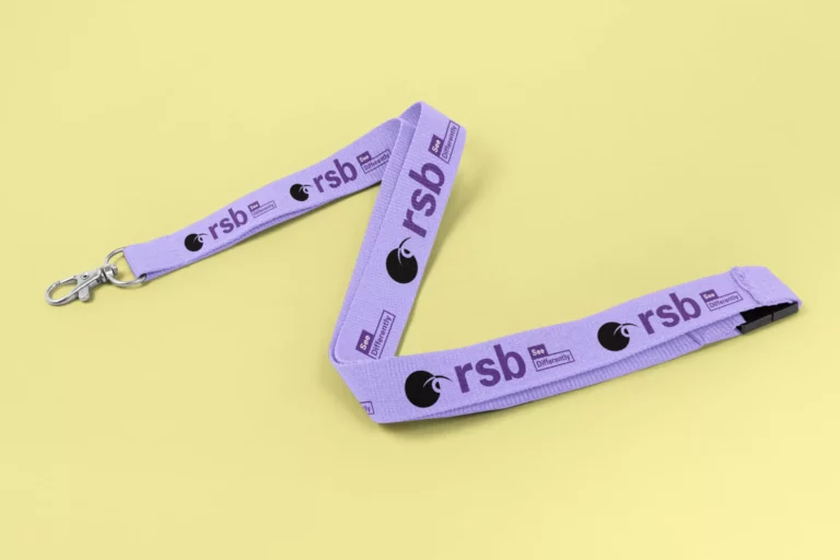 A purple lanyard featuring a printed black logo.