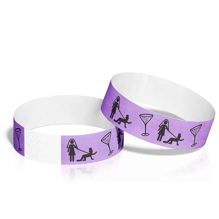 A pair of custom wristbands featuring purple designs, suitable for events.