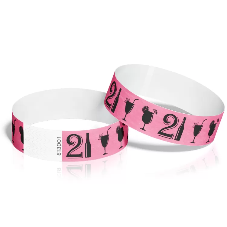 A pair of custom wristbands featuring cocktail drinks and the number "21", designed for a 21st birthday party.